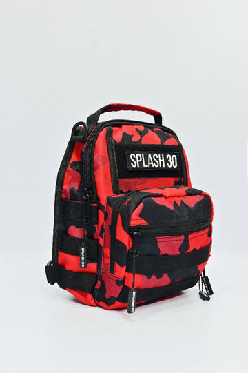 Red and black camouflage backpack with 'Splash 30' label on a light gray background
