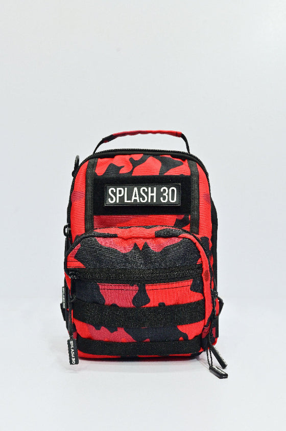Red and black camouflage backpack with 'Splash 30' label on a light gray background