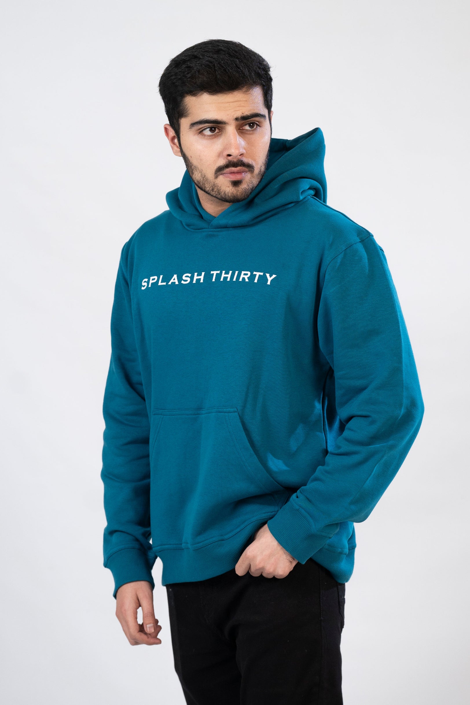 Man wearing a blue hoodie with 'SPLASH THIRTY' text on a white background