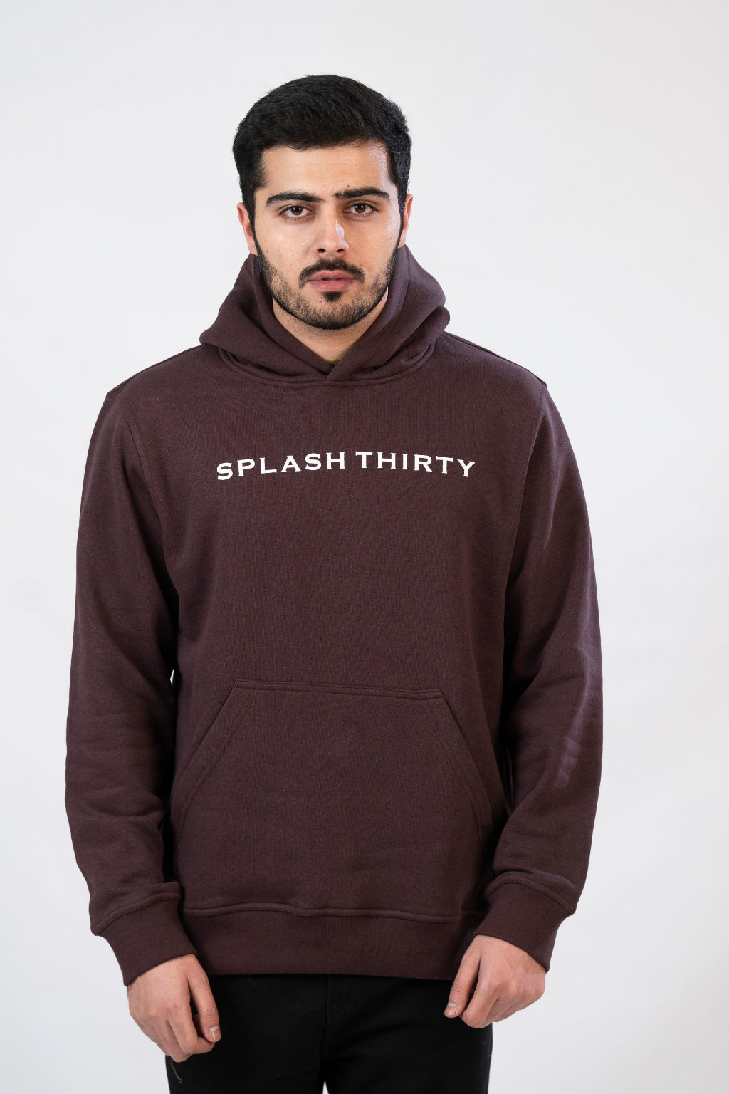 Man wearing a brown hoodie with 'Splash Thirty' text on a white background