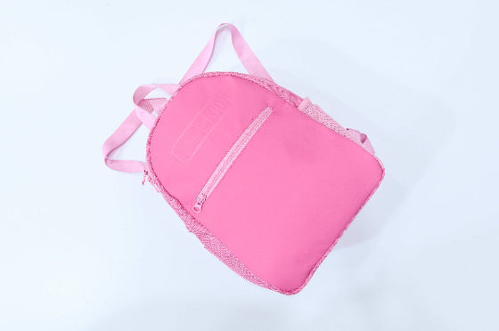 Pink backpack on a light gray background