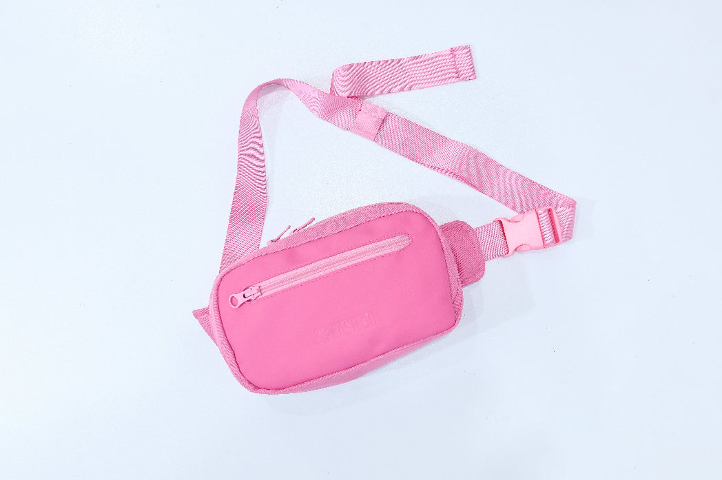 Pink waist bag on a light gray background
