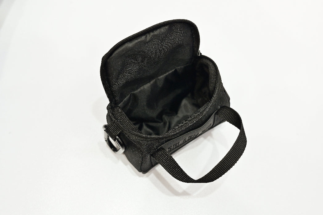 Black bag with a strap on a white background