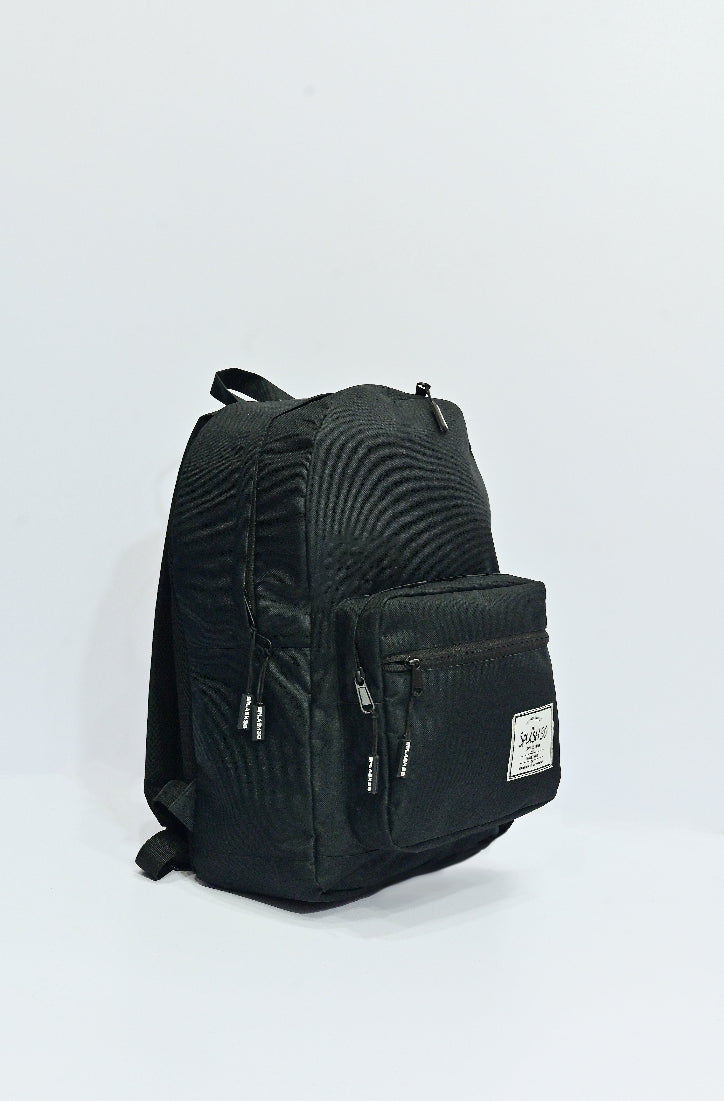 Black backpack with a visible brand label on a white background