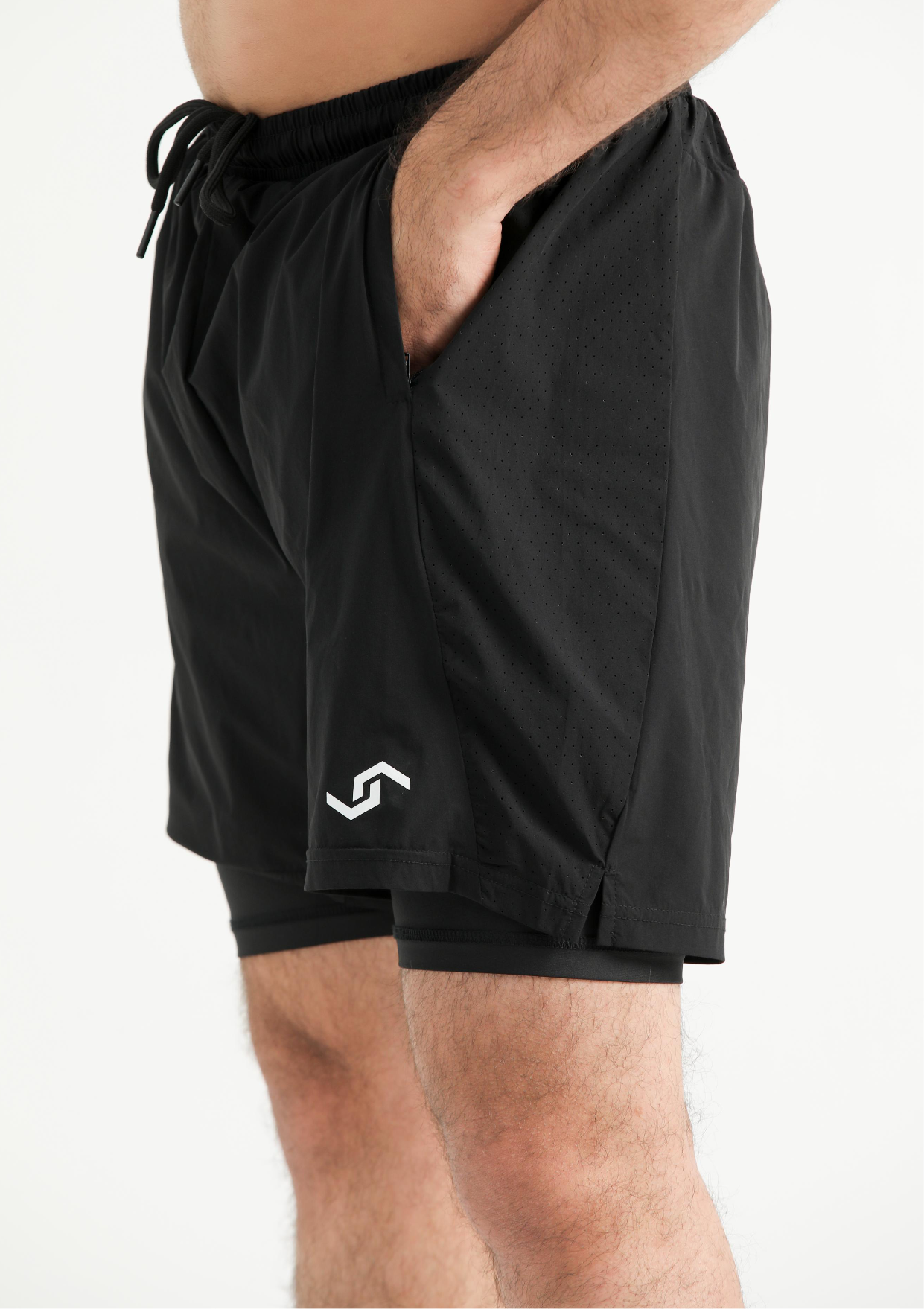 Black athletic shorts with a logo on a white background