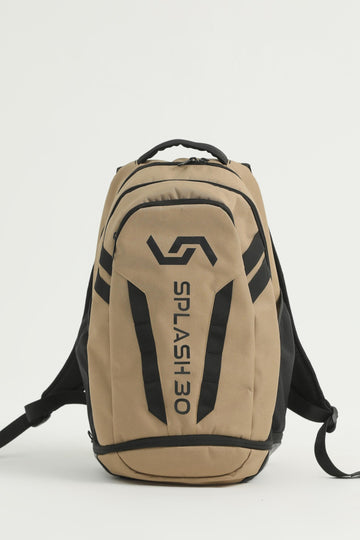 A beige and black Splash everyday backpack with multiple compartments, a visible logo, and adjustable straps.
