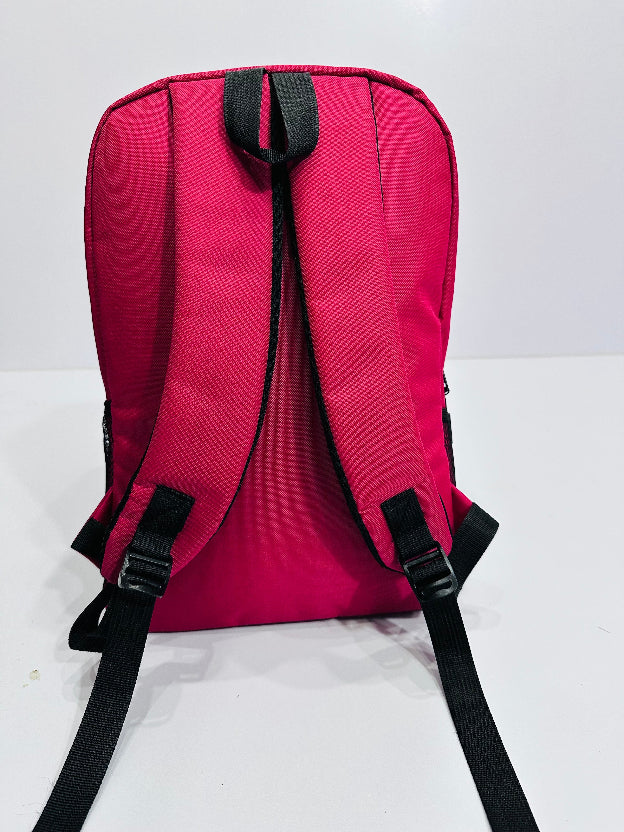 Red backpack with black straps on a white background