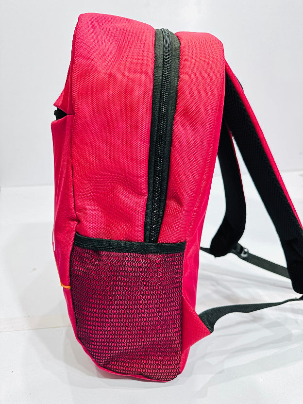 Red backpack with a mesh pocket on a white background