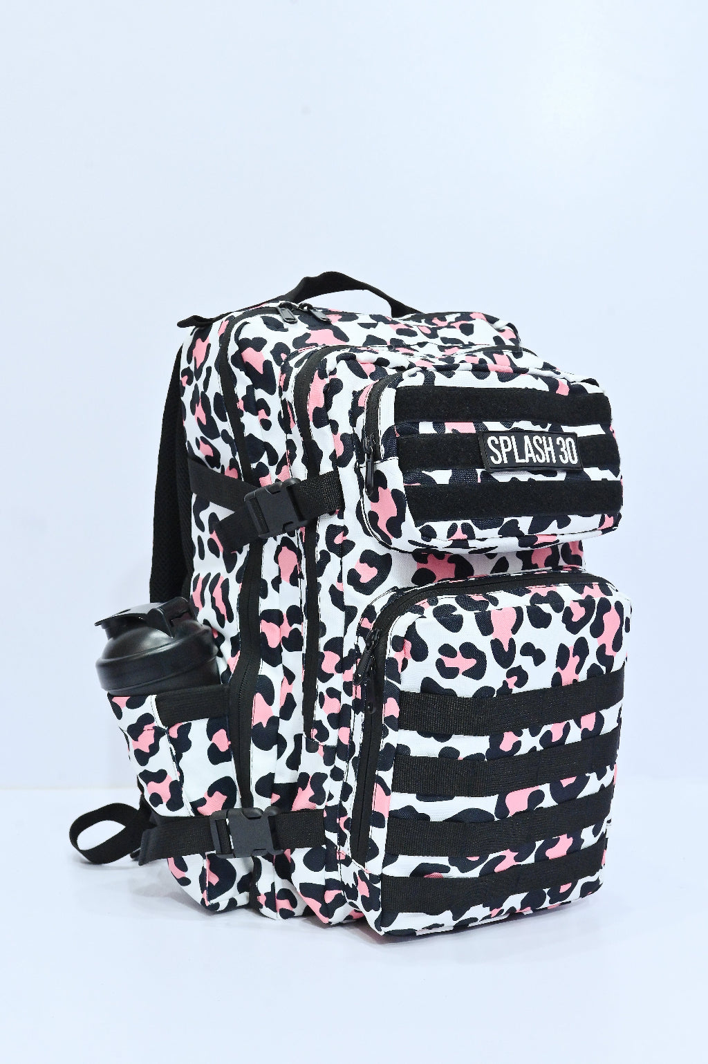 Leopard print backpack with 'Splash 30' label on a light gray background
