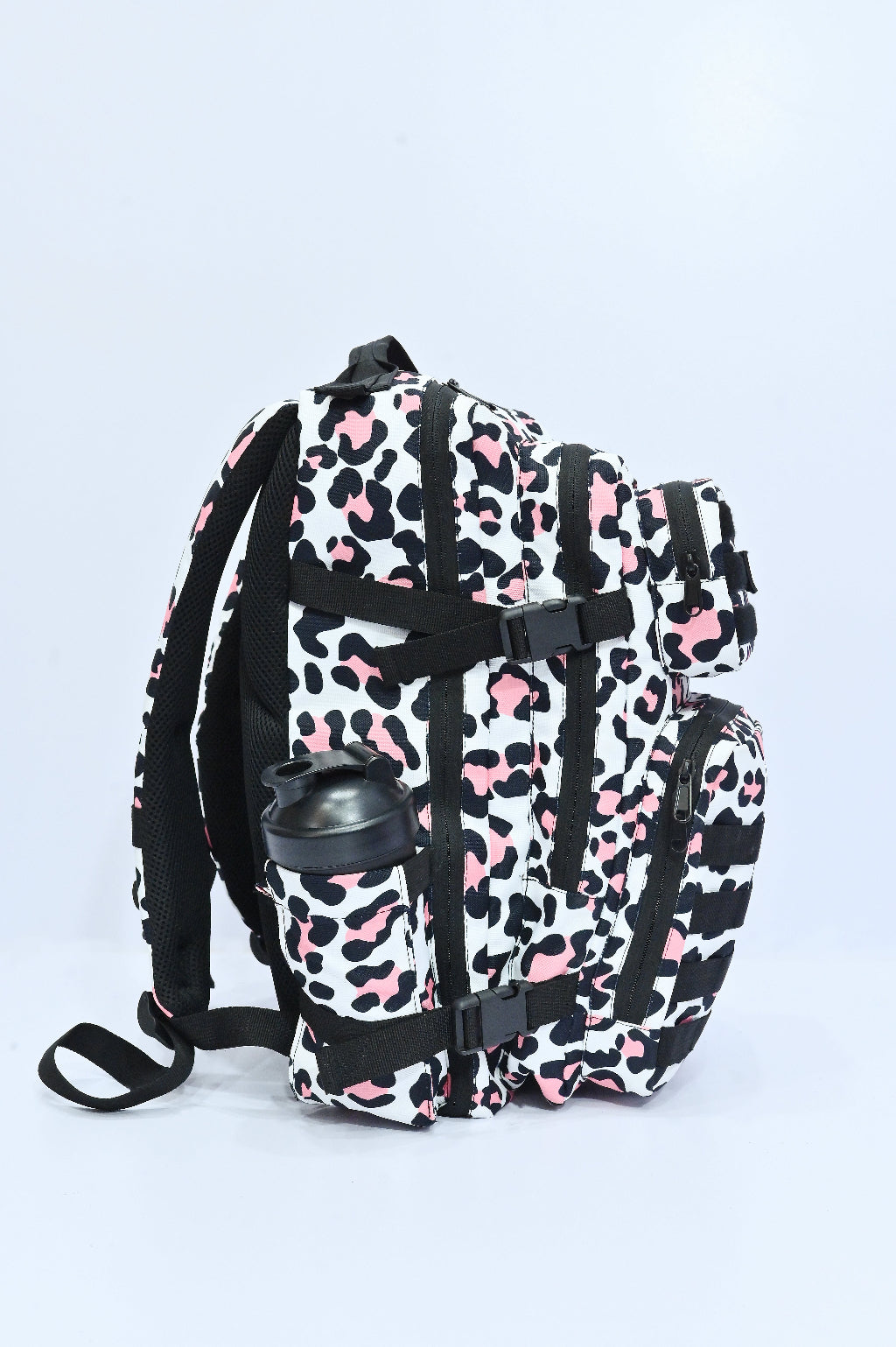 Leopard print backpack with 'Splash 30' label on a light gray background