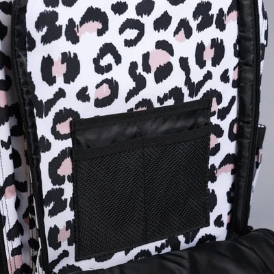 Backpack with leopard print pattern and a black pocket on a gray background
