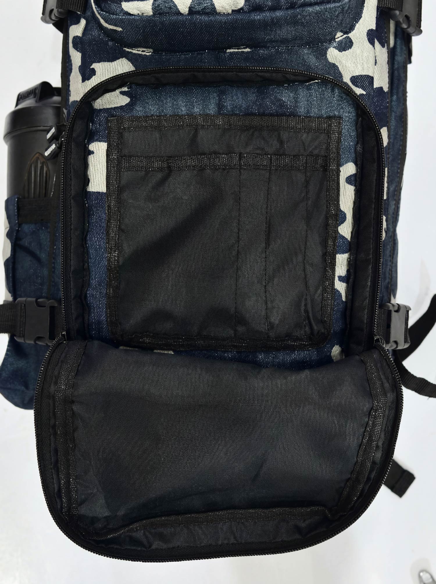Splash30 Black Camo Backpack 45L open showing compartments and laptop sleeve