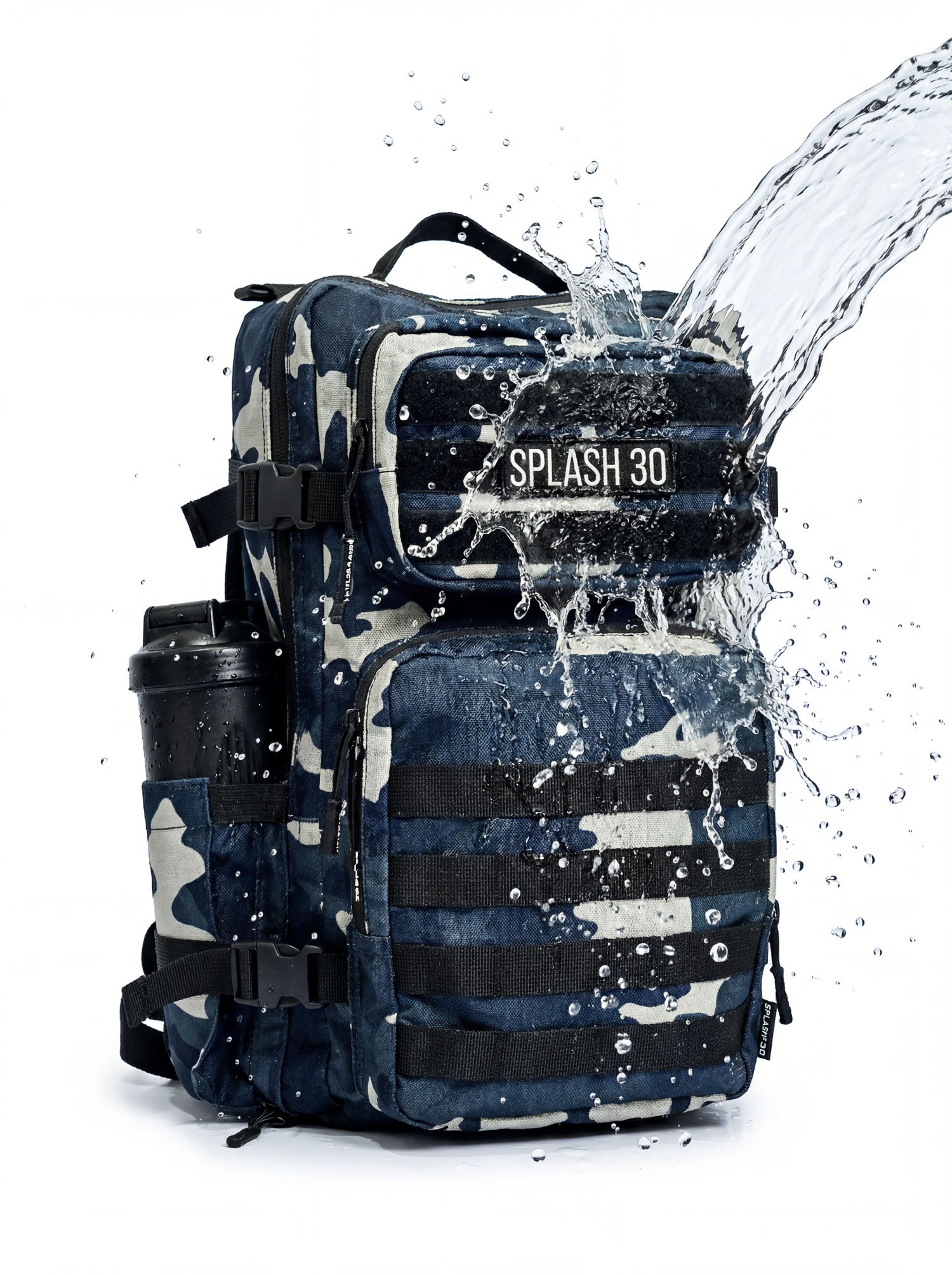 Splash30 Black Camo Backpack 45L water resistant test with water splashing on Oxford 900D
