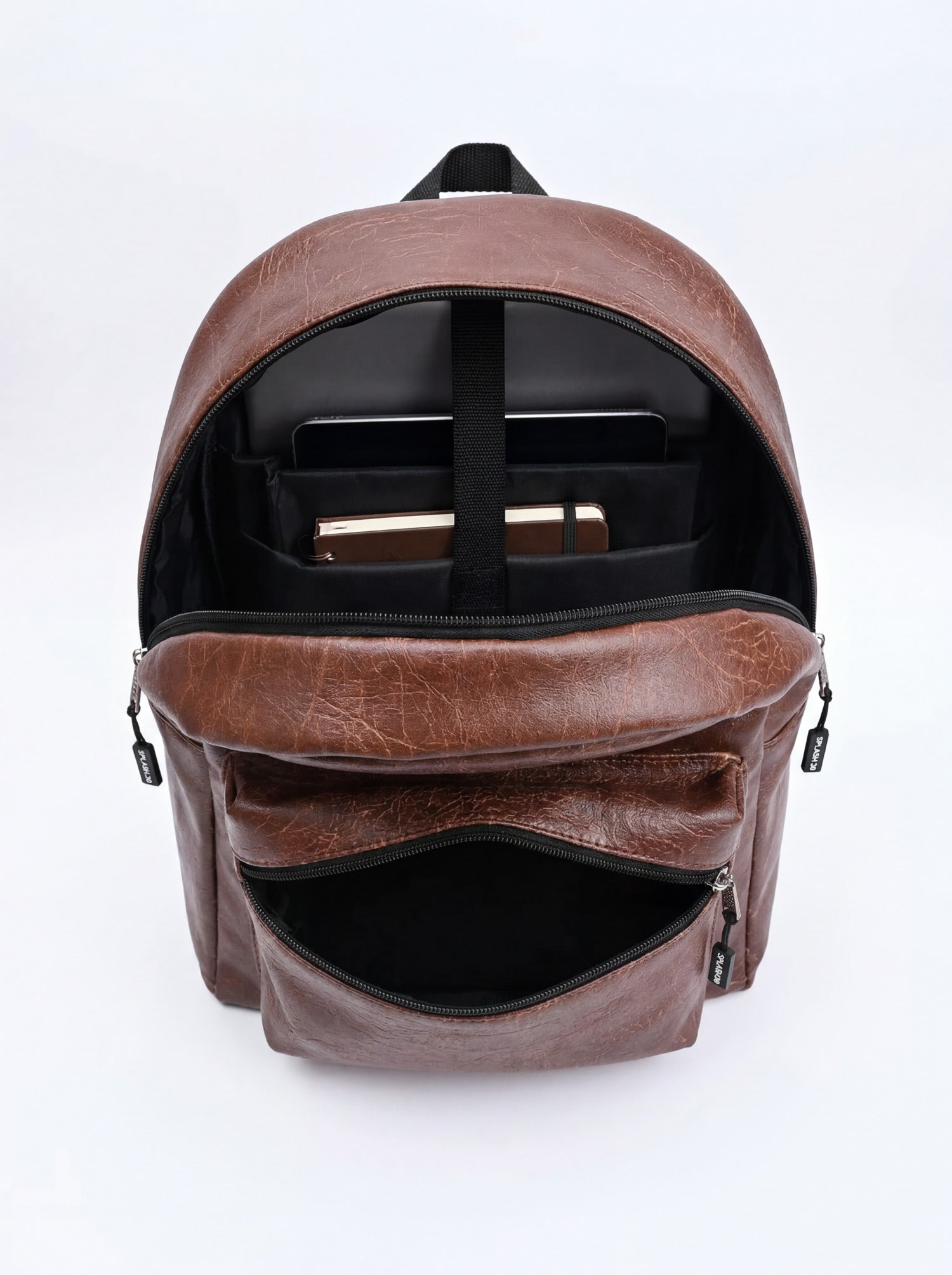 Splash30 Brown Leather Backpack 30L open front view showing 16 inch laptop and tablet in dedicated sleeves