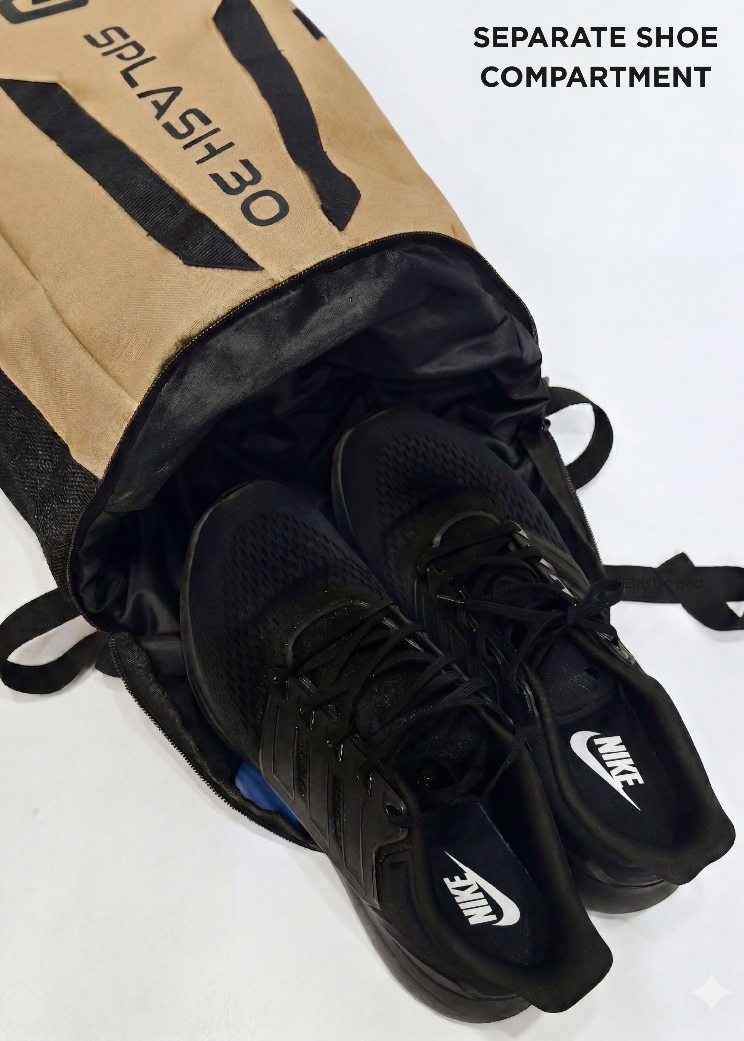 Beige Splash 30 Everyday backpack with shoes stored in the separate shoe compartment — a dedicated pocket for shoes or laundry