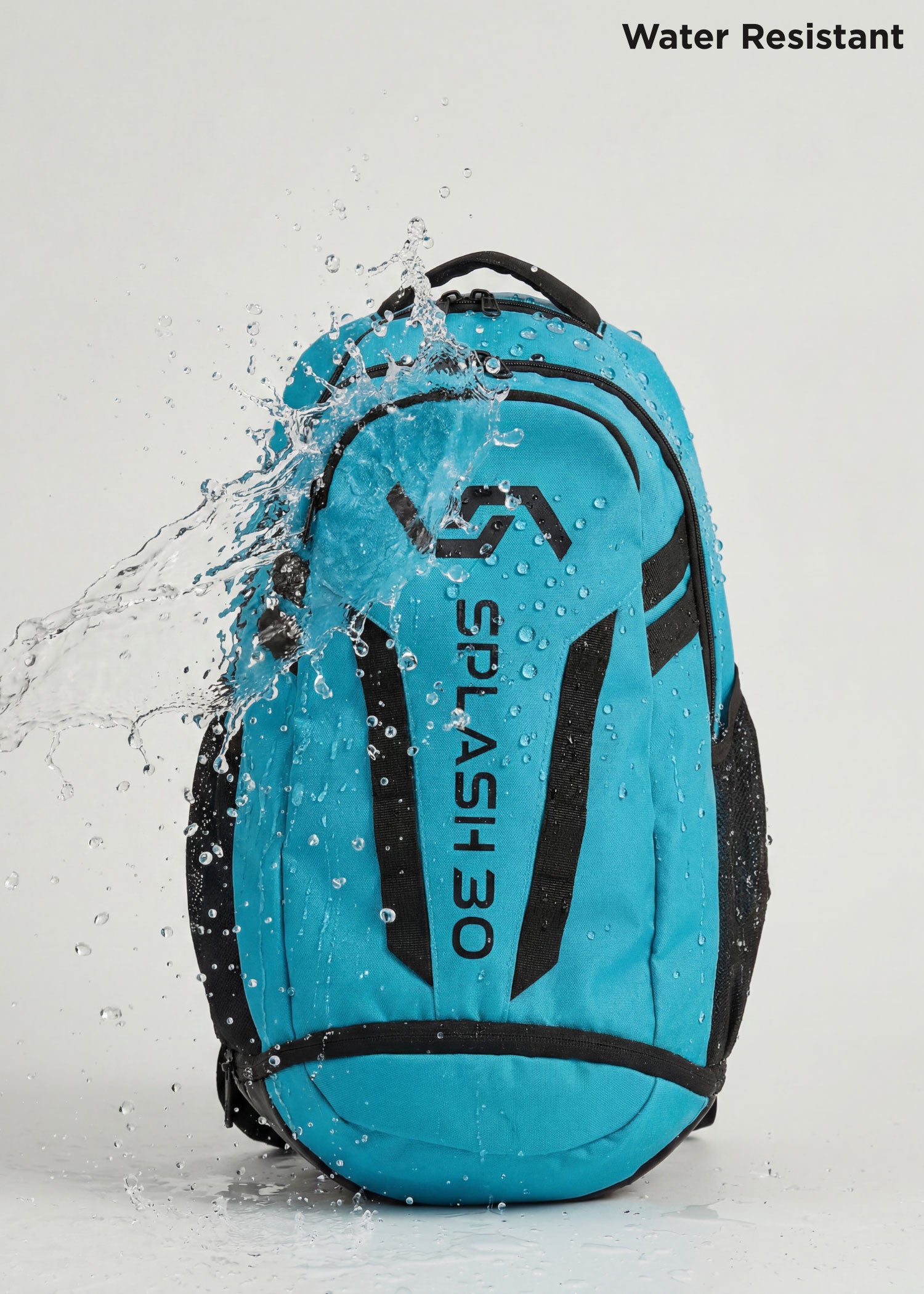 Blue Splash 30 Everyday backpack with water splashing on it, demonstrating the water-resistant fabric — keeps essentials dry