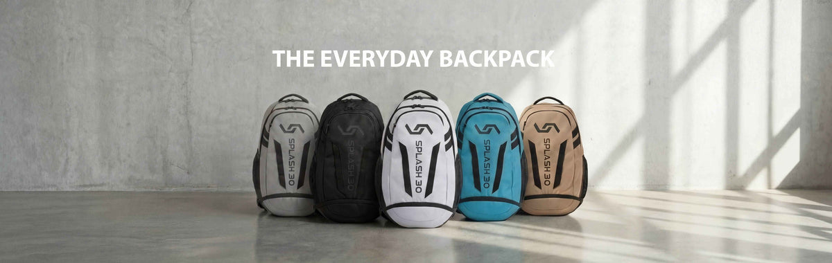 Five Splash30 Everyday Backpacks in grey, black, white, blue and beige on a light grey studio backdropslider_item_3tnBV9
