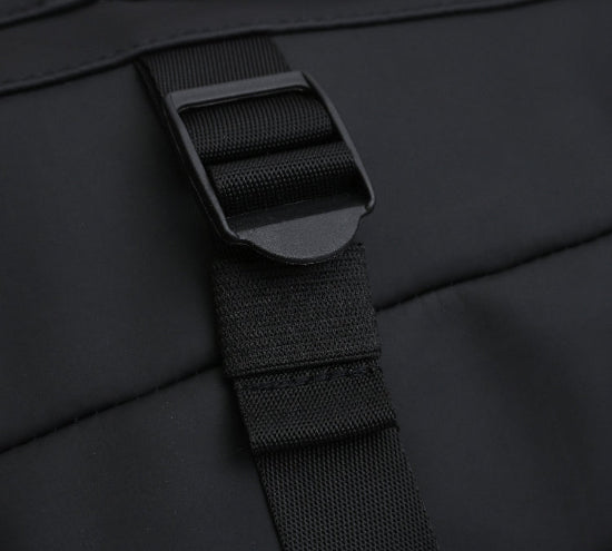Close-up of strap and buckle detail on Splash30 Urban Rubberized Backpack black
